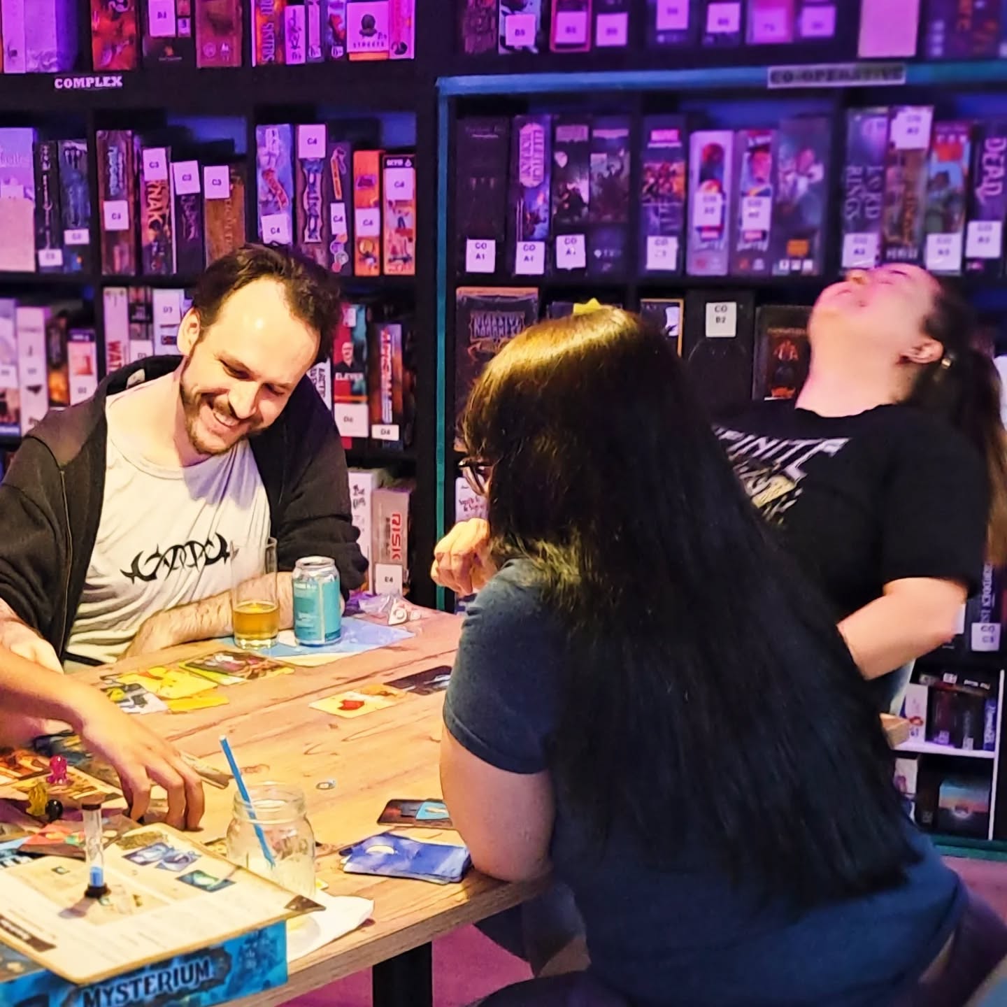 People playing board games at The Dice Box